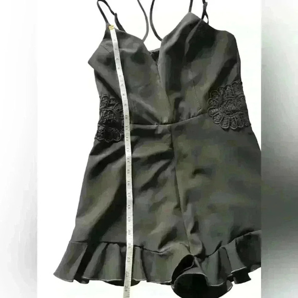 Black Romper Embroidered floral design , ruffle hem, zip up adjustable straps - Picture 8 of 13
